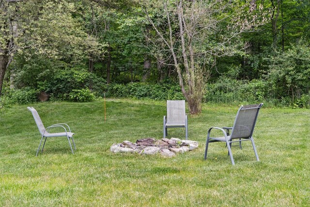 7 Gabriels Dr, Chester, NY 10918 - view of grassy yard with an outdoor fire pit