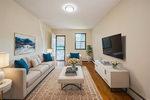 1149 E 219th St, Bronx, NY 10469 - living room with wood finished floors and baseboard heating