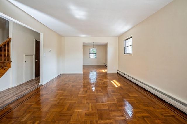 1149 E 219th St, Bronx, NY 10469 - unfurnished room featuring baseboard heating and baseboards