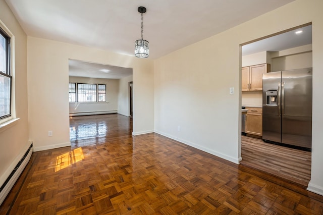 1149 E 219th St, Bronx, NY 10469 - unfurnished room with a baseboard radiator and baseboards