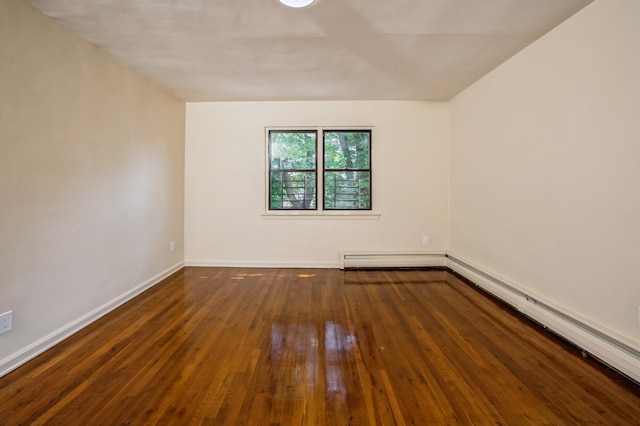 1149 E 219th St, Bronx, NY 10469 - empty room featuring hardwood / wood-style floors and baseboard heating