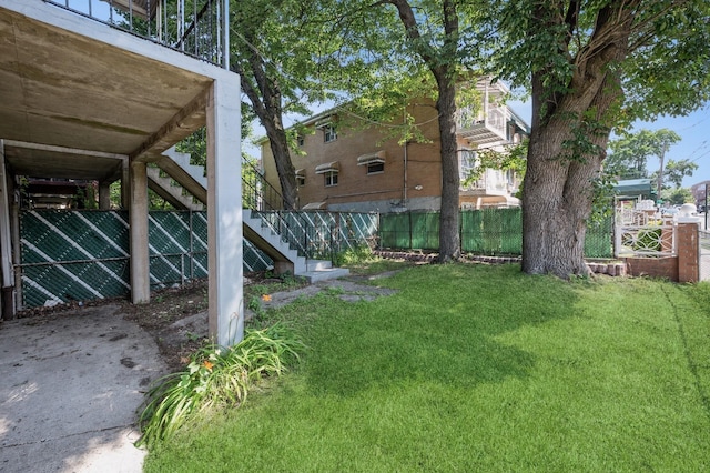 1149 E 219th St, Bronx, NY 10469 - fenced backyard with stairs