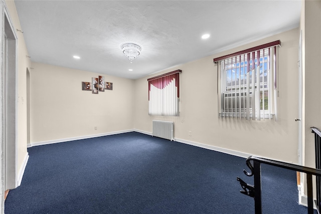 247-78 77th Cres Unit B, Bellerose, NY 11426 - empty room with radiator heating unit, recessed lighting, and baseboards