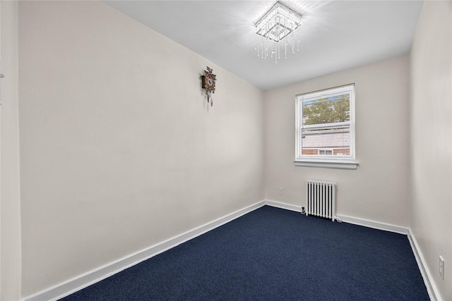 247-78 77th Cres Unit B, Bellerose, NY 11426 - spare room featuring radiator, dark colored carpet, and baseboards