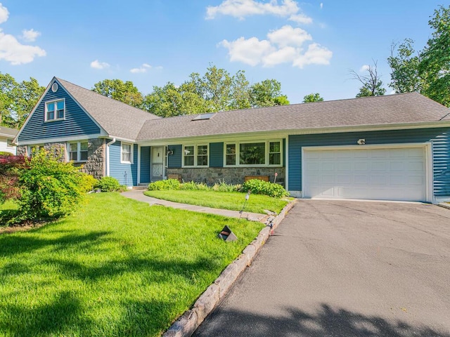 81 Winding Brook Rd, New Rochelle, NY 10804 - ranch-style house featuring stone siding, asphalt driveway, a garage, a front yard, and roof with shingles