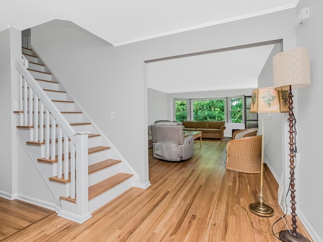 81 Winding Brook Rd, New Rochelle, NY 10804 - stairs with wood finished floors, baseboards, and ornamental molding