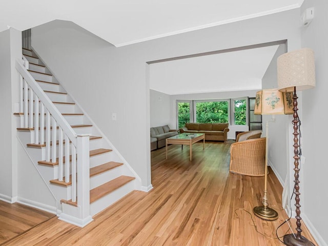 81 Winding Brook Rd, New Rochelle, NY 10804 - staircase with wood finished floors, baseboards, and ornamental molding