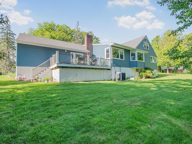 81 Winding Brook Rd, New Rochelle, NY 10804 - rear view of property featuring a chimney, a deck, a yard, stairway, and cooling unit