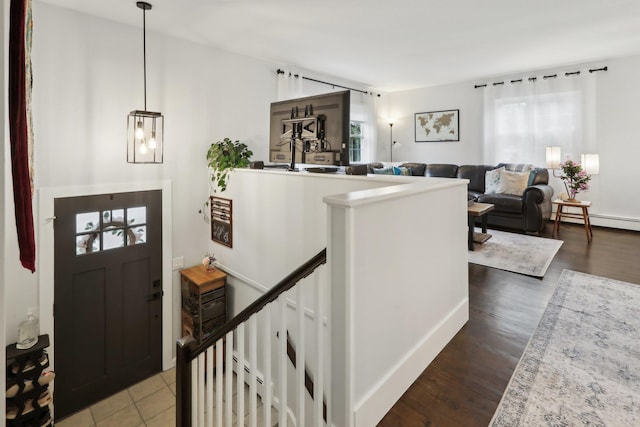 32 Meadow Rd, Montrose, NY 10567 - entrance foyer with healthy amount of natural light and wood finished floors