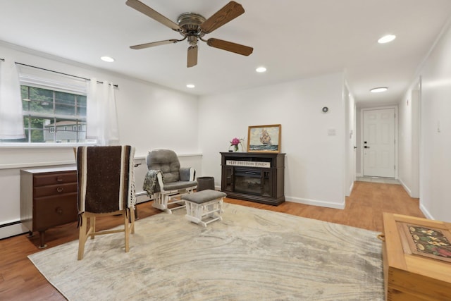 32 Meadow Rd, Montrose, NY 10567 - home office featuring wood finished floors, a glass covered fireplace, recessed lighting, and ceiling fan