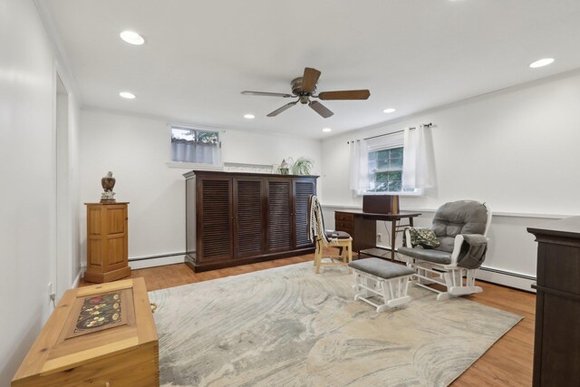 32 Meadow Rd, Montrose, NY 10567 - living area with a baseboard radiator, ceiling fan, wood finished floors, and recessed lighting
