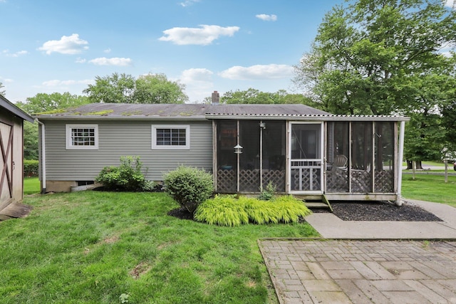 32 Meadow Rd, Montrose, NY 10567 - rear view of property featuring a lawn, a chimney, a sunroom, and a patio