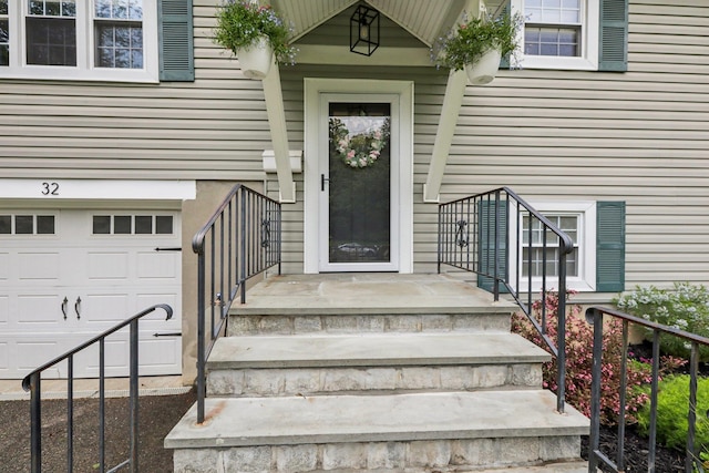 32 Meadow Rd, Montrose, NY 10567 - view of exterior entry with an attached garage