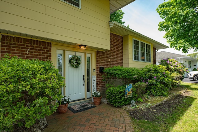 8 Baylor Dr, Smithtown, NY 11787 - property entrance with brick siding