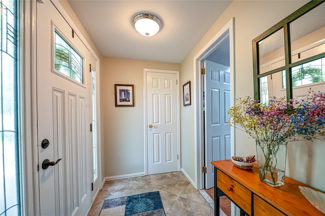 8 Baylor Dr, Smithtown, NY 11787 - entrance foyer featuring baseboards and light tile patterned floors