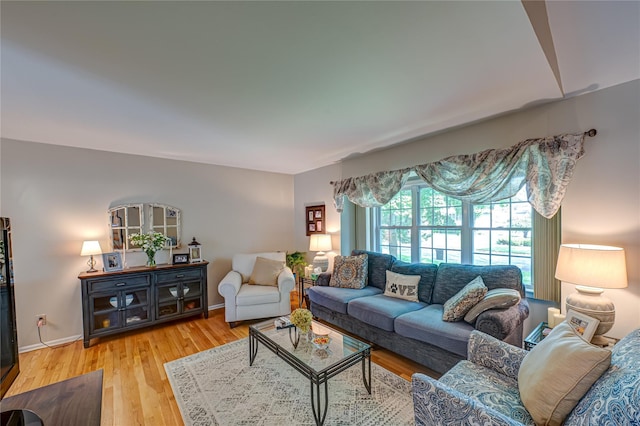8 Baylor Dr, Smithtown, NY 11787 - living room featuring light wood-type flooring and baseboards