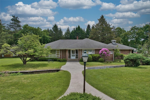 29 Maiden Ln, Port Jervis, NY 12771 - single story home featuring a front lawn, brick siding, driveway, and a shingled roof