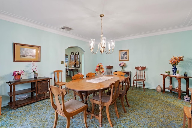29 Maiden Ln, Port Jervis, NY 12771 - dining room featuring carpet flooring, arched walkways, ornamental molding, a chandelier, and baseboards