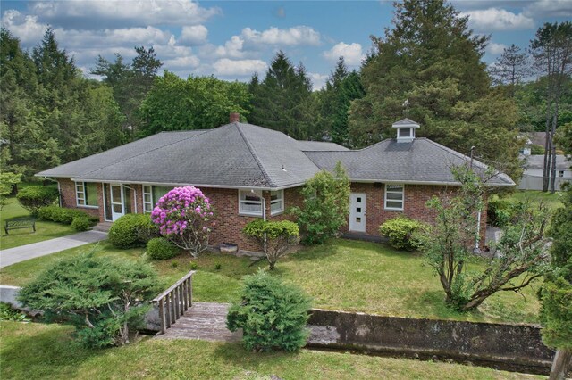 29 Maiden Ln, Port Jervis, NY 12771 - single story home featuring brick siding, a front lawn, a shingled roof, and a chimney