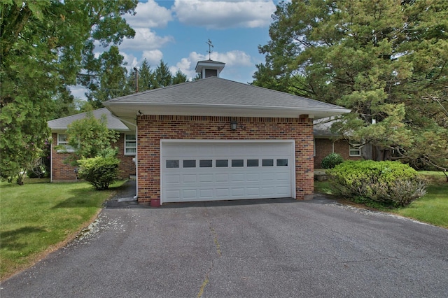 29 Maiden Ln, Port Jervis, NY 12771 - view of property exterior with driveway, a lawn, brick siding, and a garage