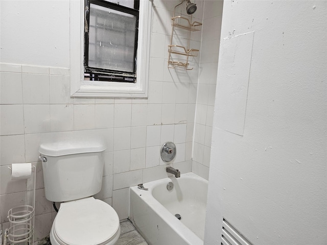 2675 Marion Ave, Bronx, NY 10458 - bathroom with tile walls and toilet