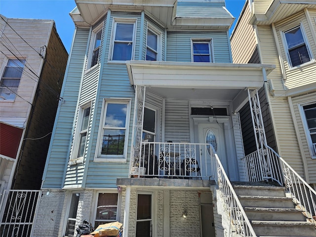 2675 Marion Ave, Bronx, NY 10458 - view of front of house featuring a porch