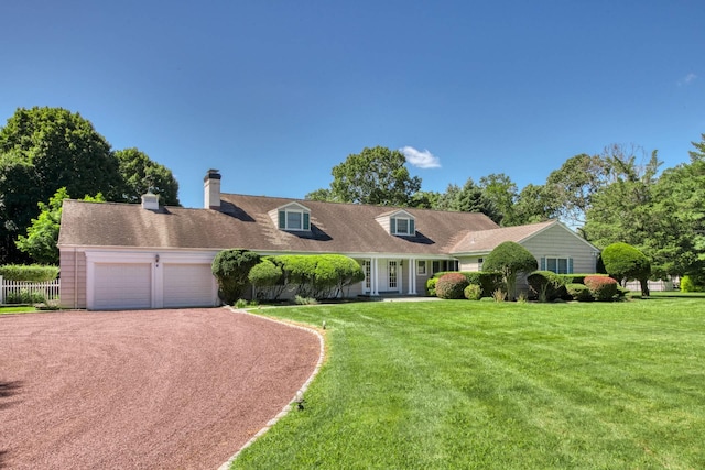 73 S Rd, Westhampton Beach, NY 11978 - new england style home featuring a garage, driveway, and a chimney
