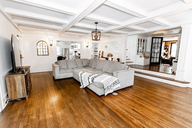 31 Heminway Ave, New Rochelle, NY 10801 - living room featuring coffered ceiling, wood finished floors, beamed ceiling, baseboards, and ornate columns