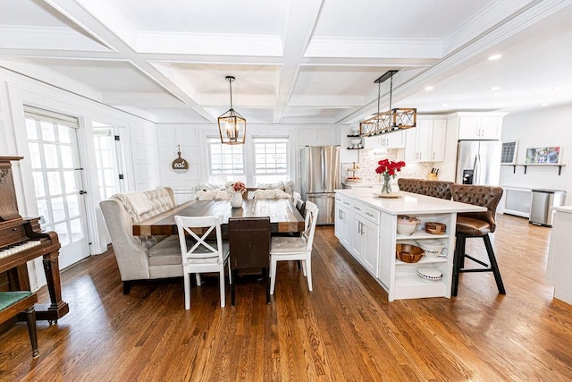 31 Heminway Ave, New Rochelle, NY 10801 - dining space with dark wood-style floors, beam ceiling, coffered ceiling, recessed lighting, and a chandelier