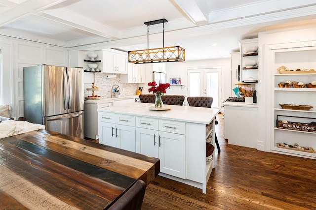 31 Heminway Ave, New Rochelle, NY 10801 - kitchen with open shelves, freestanding refrigerator, light countertops, white cabinets, and beamed ceiling