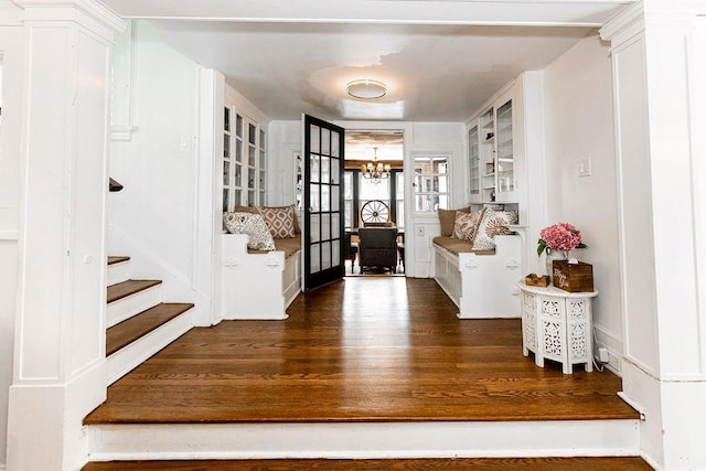 31 Heminway Ave, New Rochelle, NY 10801 - foyer entrance with wood finished floors, a chandelier, and stairs