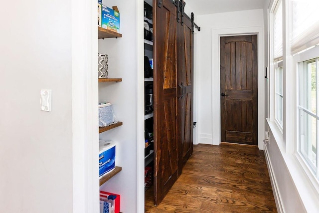 31 Heminway Ave, New Rochelle, NY 10801 - corridor featuring dark wood-style flooring and a barn door