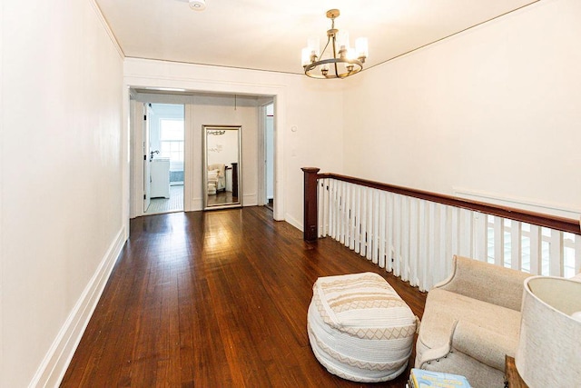31 Heminway Ave, New Rochelle, NY 10801 - hall with a chandelier, wood finished floors, and baseboards