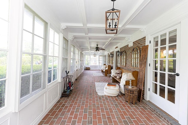 31 Heminway Ave, New Rochelle, NY 10801 - sunroom / solarium with coffered ceiling, brick flooring, beamed ceiling, and a chandelier