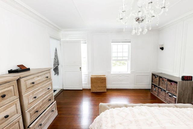 31 Heminway Ave, New Rochelle, NY 10801 - bedroom with a decorative wall, dark wood-style flooring, crown molding, and a chandelier