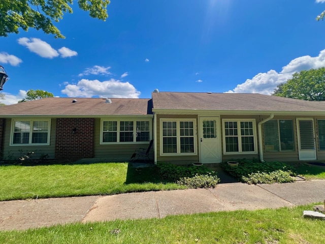 75A Enfield Ct Unit 75A, Ridge, NY 11961 - ranch-style home featuring a front yard and brick siding