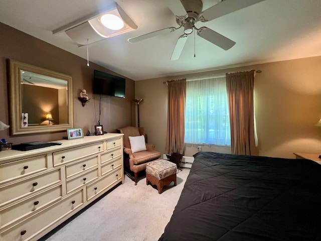 75A Enfield Ct Unit 75A, Ridge, NY 11961 - bedroom featuring light carpet, a ceiling fan, and a baseboard radiator