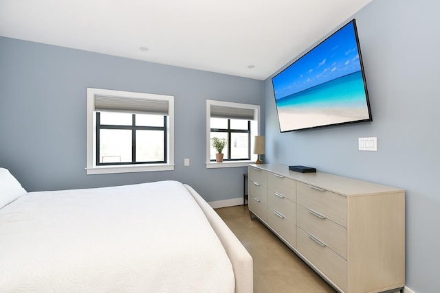 70 S Main St Unit 307-Ph, Freeport, NY 11520 - bedroom featuring baseboards