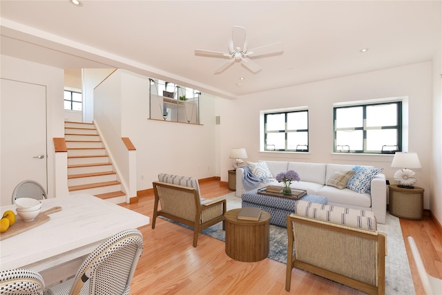 70 S Main St Unit 307-Ph, Freeport, NY 11520 - living area featuring plenty of natural light, stairway, light wood-style flooring, a ceiling fan, and recessed lighting