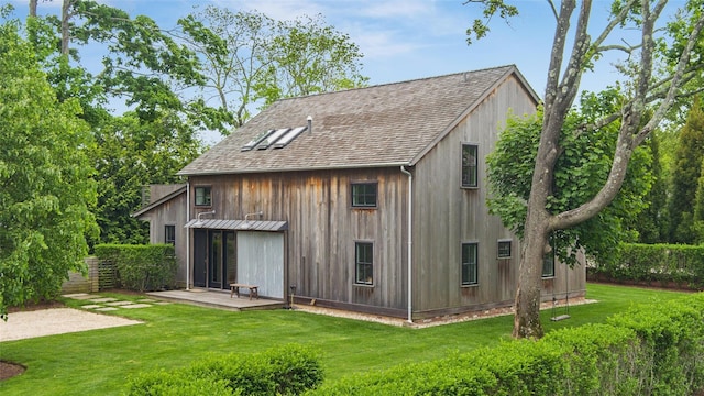 3 Pheasant Ln, Remsenburg, NY 11960 - rear view of house featuring a shingled roof, a yard, and a deck