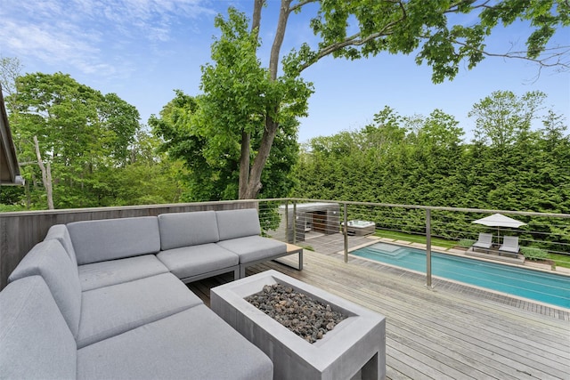 3 Pheasant Ln, Remsenburg, NY 11960 - wooden deck with an outdoor living space with a fire pit