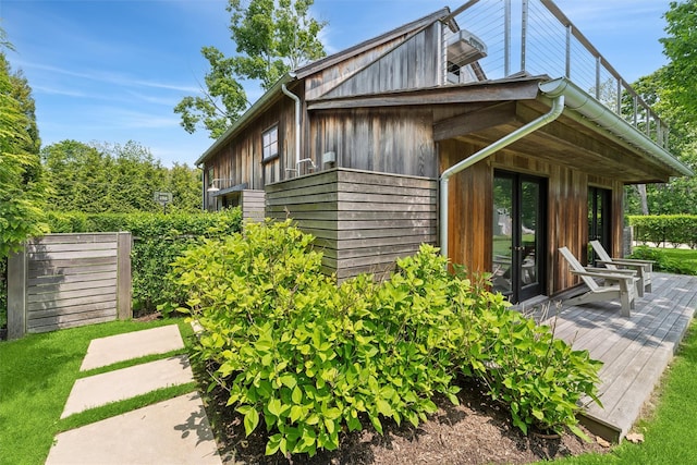 3 Pheasant Ln, Remsenburg, NY 11960 - rear view of property featuring a wooden deck