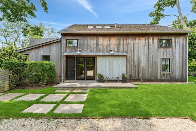 3 Pheasant Ln, Remsenburg, NY 11960 - rear view of house featuring a lawn and a patio