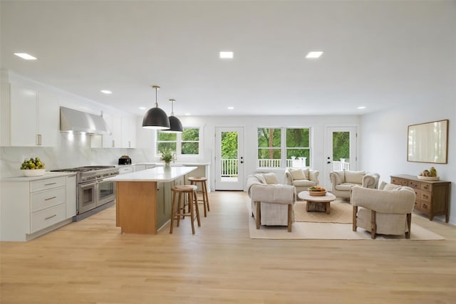 2 Crawford Rd, Harrison, NY 10528 - living area featuring light wood-style flooring and recessed lighting