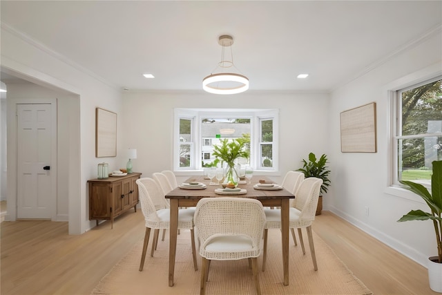 2 Crawford Rd, Harrison, NY 10528 - dining room featuring light wood-style flooring, healthy amount of natural light, ornamental molding, baseboards, and recessed lighting