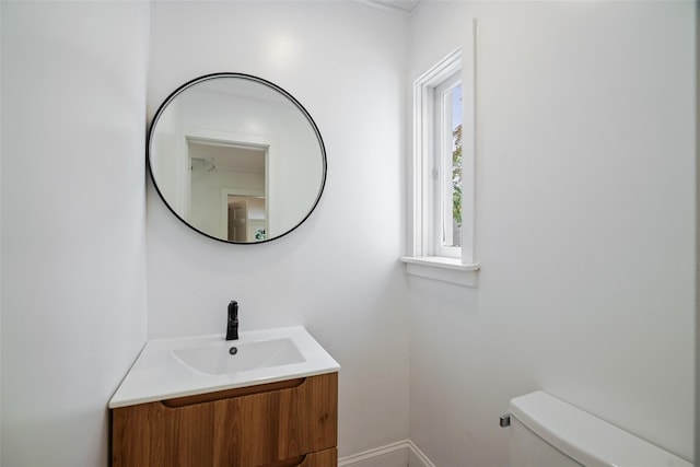 2 Crawford Rd, Harrison, NY 10528 - bathroom with vanity, toilet, and baseboards