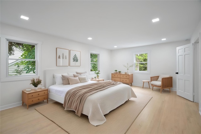 2 Crawford Rd, Harrison, NY 10528 - bedroom with light wood-style flooring, baseboards, and recessed lighting
