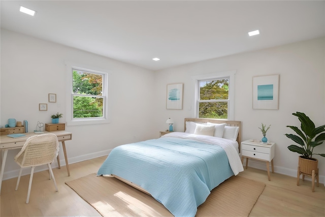 2 Crawford Rd, Harrison, NY 10528 - bedroom with light wood-style floors, baseboards, and recessed lighting