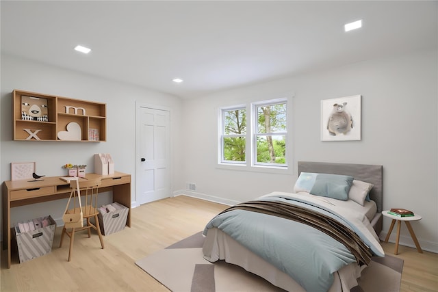 2 Crawford Rd, Harrison, NY 10528 - bedroom with light wood-type flooring and baseboards