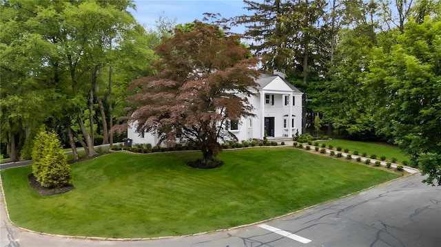 2 Crawford Rd, Harrison, NY 10528 - greek revival inspired property featuring a front yard